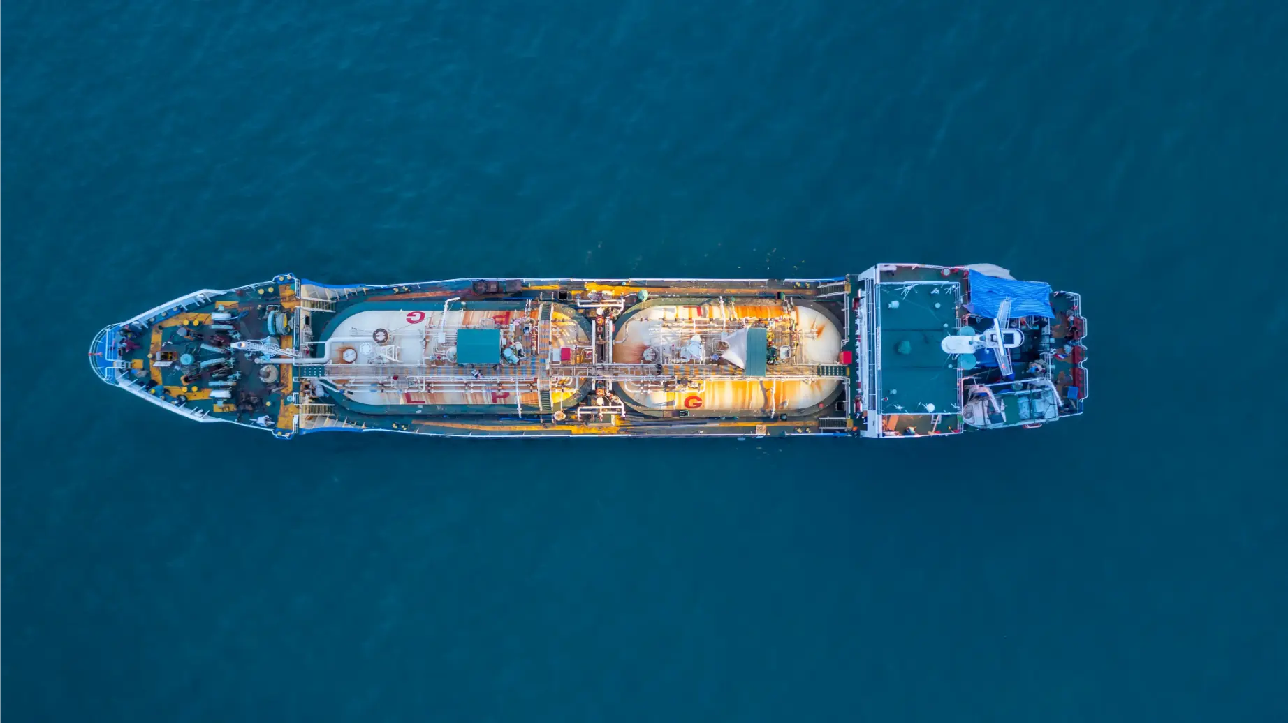 Aerial view of an oil and gas LPG tanker ship navigating open waters
